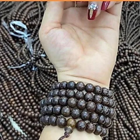 Chuỗi vòng gỗ 108 hạt  mun đen 6li và 8 li lông đuôi công đẹp, phù hợp với mọi độ tuổi