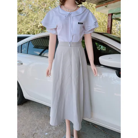 Set 3 chi tiết gồm áo sơ mi + chân váy dài + áo khoác Giá 450k Hàng có sẵn giao ngay Màu ghi