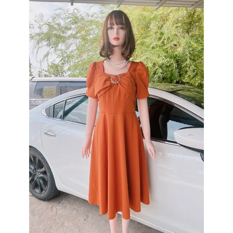 Đầm cách điệu màu cam Giá 290k Hàng có sẵn giao ngay Chất liệu umi cao cấp, có sẵn mút ngực