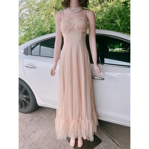 Đầm maxi 2 dây cách điệu phần ngực Màu nude Có sẵn mút ngực Giá 390k Hàng có sẵn giao ngay Dáng dài