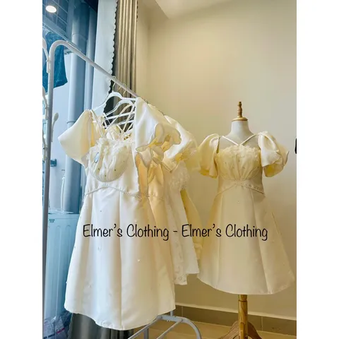 Đầm thiết kế cổ hoa trước ngực 2 dây tay bồng  màu kem Đủ size Hàng có sẵn giao ngay M eo 76cm Giá 299k