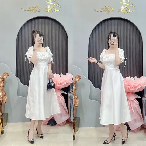 Đầm xoè cổ U đính ngọc  trước ngực tay phồng nhúng cột nơ tiểu thư Giá 290k Màu trắng  Chất liệu lụa 2 lớp xịn