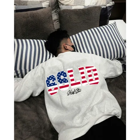 Áo sweater raplang tay chéo  nam nữ in chữ SSLID STU phối cờ mỹ hottrend thu đông 2025 chất nỉ mềm ấm k xù