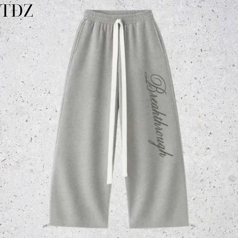Quần Dài Nỉ 2 Da Unisex Nam Nữ Ống Rộng Hình Thêu Nổi THROUGH