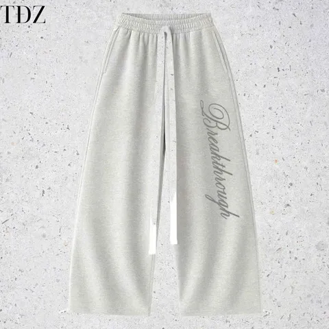 Quần Dài Nỉ 2 Da Unisex Nam Nữ Ống Rộng Hình Thêu Nổi THROUGH