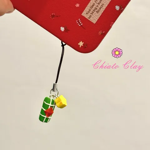 Dây treo điện thoại Bánh tét - Hoa mai
