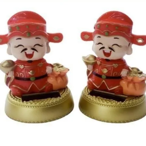 Tượng thần tài kèm túi vàng sử dụng năng lượng mặt trời cao 11cm cực đẹp