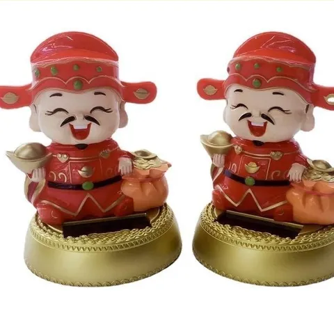 Tượng thần tài kèm túi vàng sử dụng năng lượng mặt trời cao 11cm cực đẹp