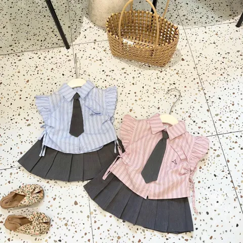 Đồng phục học sinh, set áo sơ mi kẻ kèm cà vạt và chân váy xếp ly sz 14-32kg
