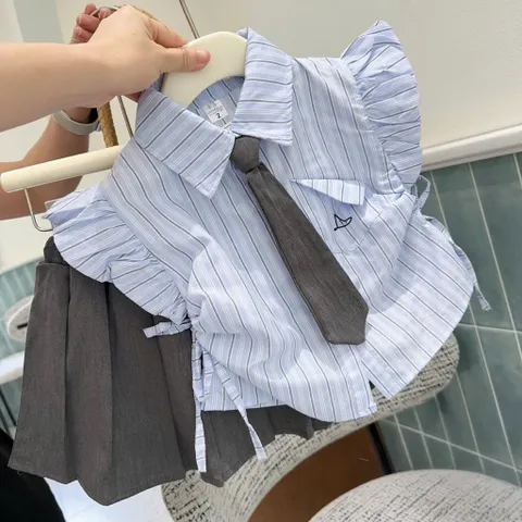 Đồng phục học sinh, set áo sơ mi kẻ kèm cà vạt và chân váy xếp ly sz 14-32kg