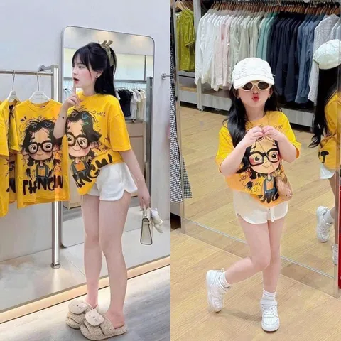 Quần áo bé gái, set áo cotton tone vàng tươi họa tiết cô gái kèm quần short trắng cho bé 10-50kg