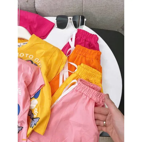 Quần áo bé gái, set bộ quần áo cộc tay chất cotton họa tiết cô gái đeo nơ size 10-38kg