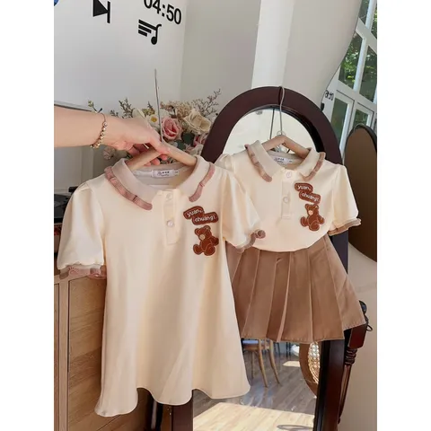 Đồng phục học sinh, váy đồng phục thêu gấu nâu cho bé 10-30kg