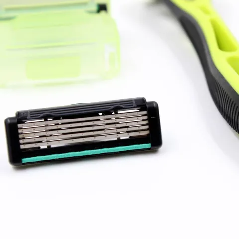 Dao cạo râu Kai Xfit 5 blade White Conc Nhật xanh lá có 4 đầu thay và nắp nhựa bảo vệ (hộp dài)