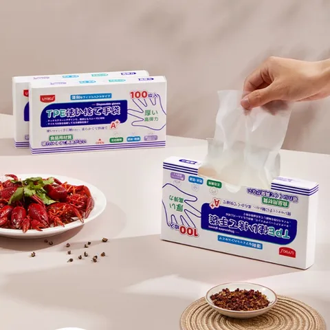 Găng tay TPE dùng 1 lần siêu dai UYIKU Nhật Bản đa năng không bột, an toàn, tiện lợi hộp 100 cái