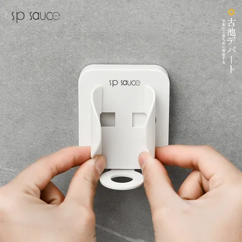 Giá đỡ bàn chải điện dán tường đa năng UYIKU Nhật Bản có lỗ sạc tiện dụng