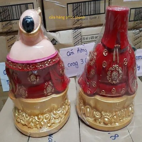 Thần tài ông địa đế tròn đỏ ( nhựa ) có hoả tốc