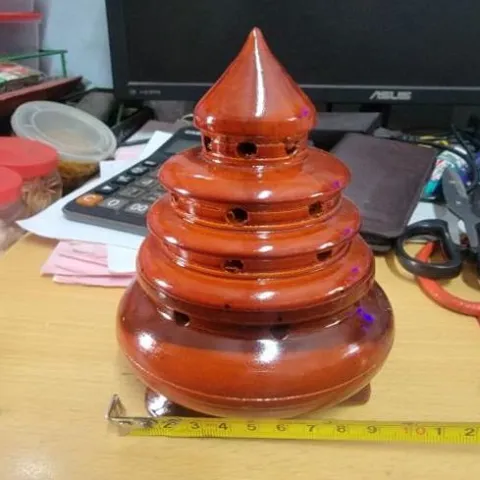 xông trầm gỗ tháp nâu có hoả tốc
