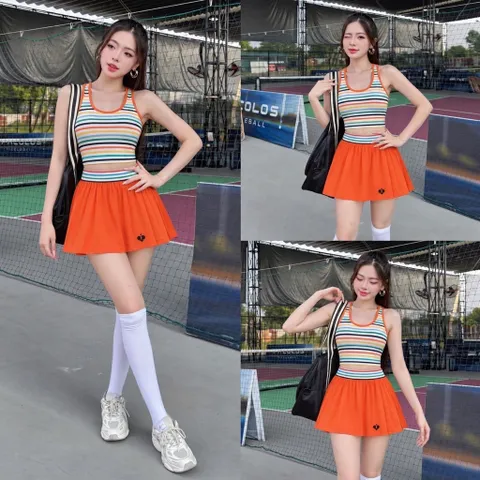 Set thể thao nữ áo ba lỗ tăm lạnh sọc màu có đệm ngực, chân váy cam kèm quần bảo hộ