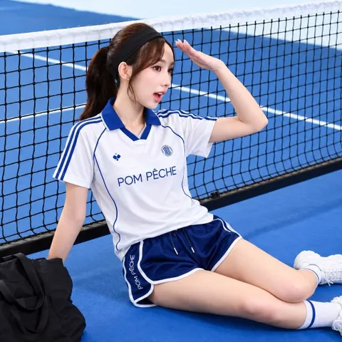 Bộ đùi thể thao nữ POM PÊCHE áo cổ bẻ tay ngắn quần short viền màu co giãn thoáng mát