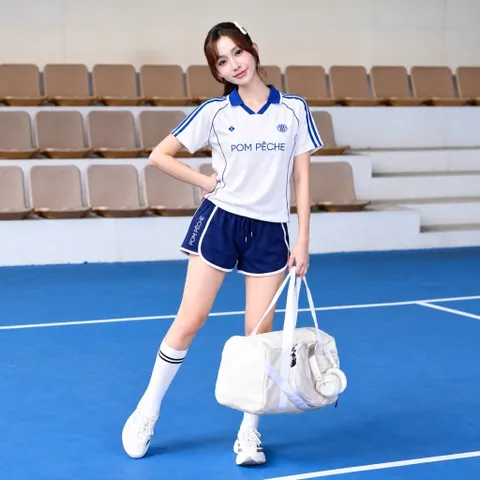 Bộ đùi thể thao nữ POM PÊCHE áo cổ bẻ tay ngắn quần short viền màu co giãn thoáng mát