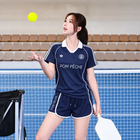 Bộ đùi thể thao nữ POM PÊCHE áo cổ bẻ tay ngắn quần short viền màu co giãn thoáng mát
