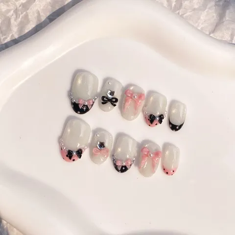 12. Nailbox nền mắt mèo vàng hoạ tiết nơ