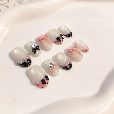 12. Nailbox nền mắt mèo vàng hoạ tiết nơ