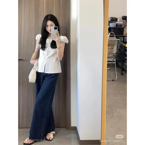 Áo trắng tay phồng cổ nơ – Thanh lịch, nữ tính và dễ phối đồ