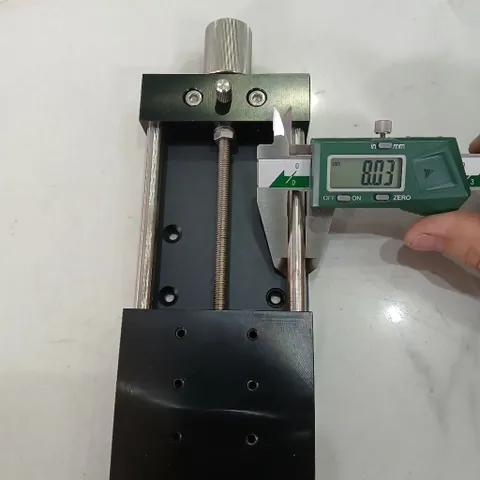 bàn trượt nhôm trượt tròn phi vít me cơ 0601 hành trình 100