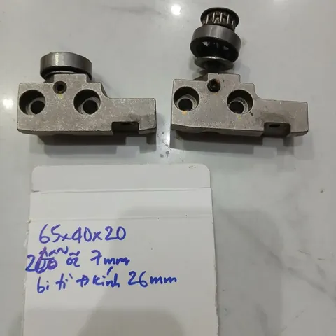 cụm bi tì căng dây đai cài vị trí  vòng bi kèm pad nhôm thép gạt cell pin tì phôi ép vật liệu