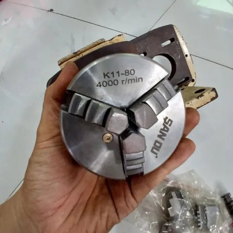 11kg cụm đầu trục mặt bích mâm cặp 80 kèm chấu trái thông lỗ 16 chế khoan phay mài trục A B