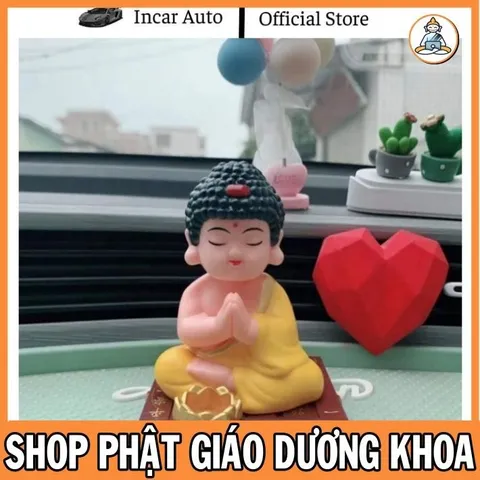 Tượng Phật A Di Đà Gật Gù Trang Trí Taplo Xe Hơi Chất Liệu Nhựa ABS Dùng Năng Lượng Mặt Trời cực đẹp