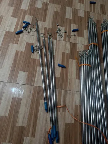 móc kéo cửa cuốn inox dài 2 mét .