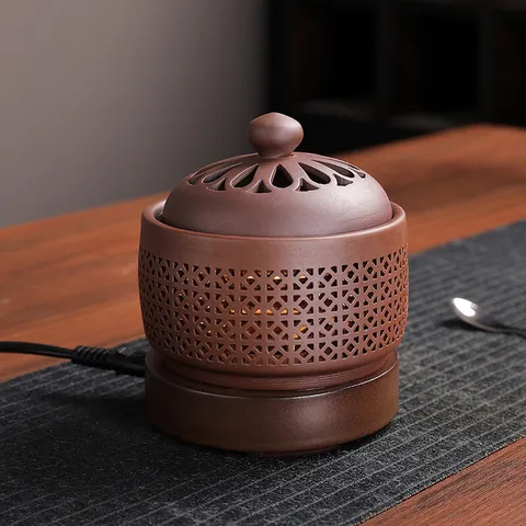 Lò xông trầm hương bằng điện bằng gốm cao cấp có đèn phát sáng( QUÀ :15g bột trầm kiến)