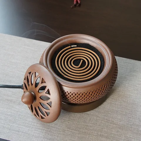 Lò xông trầm hương bằng điện có đèn phát sáng, chất liệu gốm cao cấp sang trọng( QUÀ : Miếng trầm bỏ ví Tài Lộc)