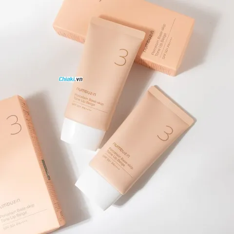 Kem Chống Nắng Nâng Tone Numbuzin No.3 Porcelain Base-skip Beige SPF50+ - Bảo Vệ Da Toàn Diện, Dưỡng Sáng Mịn Màu Da