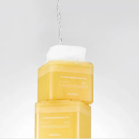 Toner Pad Mediheal Vitamide Brightening - Hỗ trợ làm sáng da, cấp ẩm, cải thiện vết thâm, hộp 100 miếng, phù hợp cho da nhạy cảm.