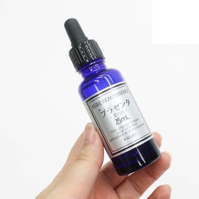 Tinh chất nhau thai Pure Beau Essence Placenta m&agrave;u t&iacute;m 25ml Của Nhật