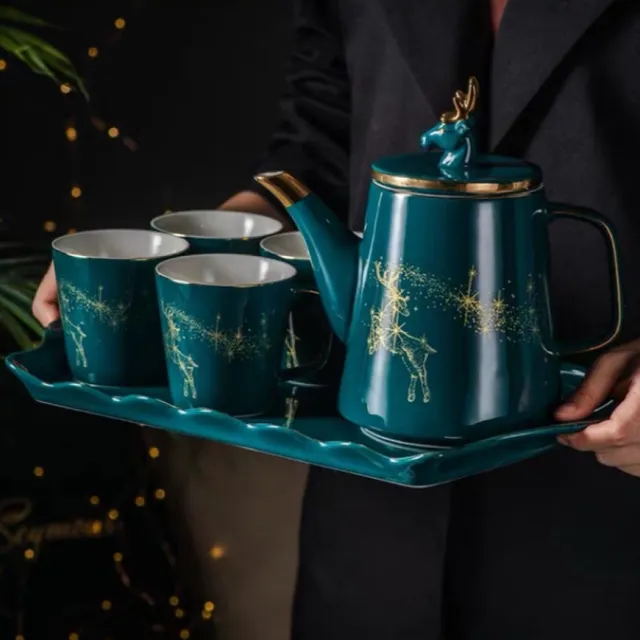 Bộ ấm ch&eacute;n sứ xanh cao cấp họa tiết tuần lộc