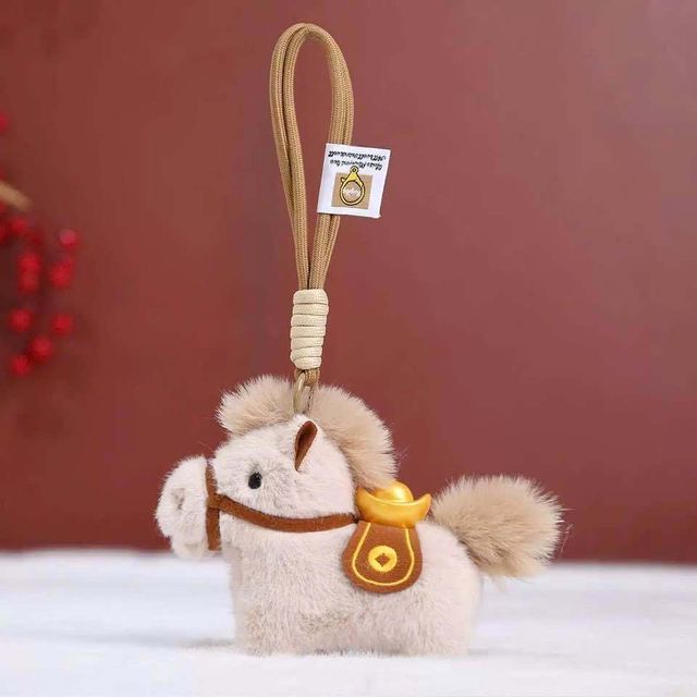 Charm ngựa c&otilde;ng v&agrave;ng