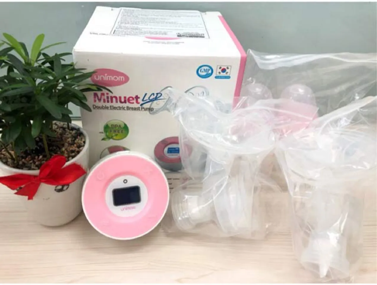 Cách đặt mua máy hút sữa điện đôi Unimom Minuet