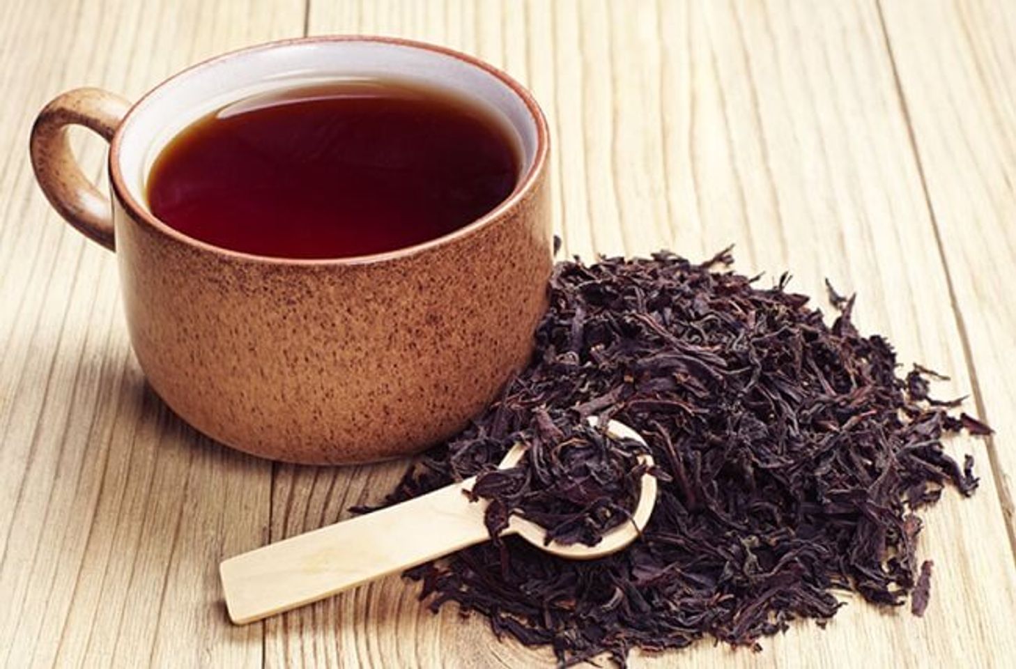Uống tr&agrave; đen gi&uacute;p giảm mỡ bụng