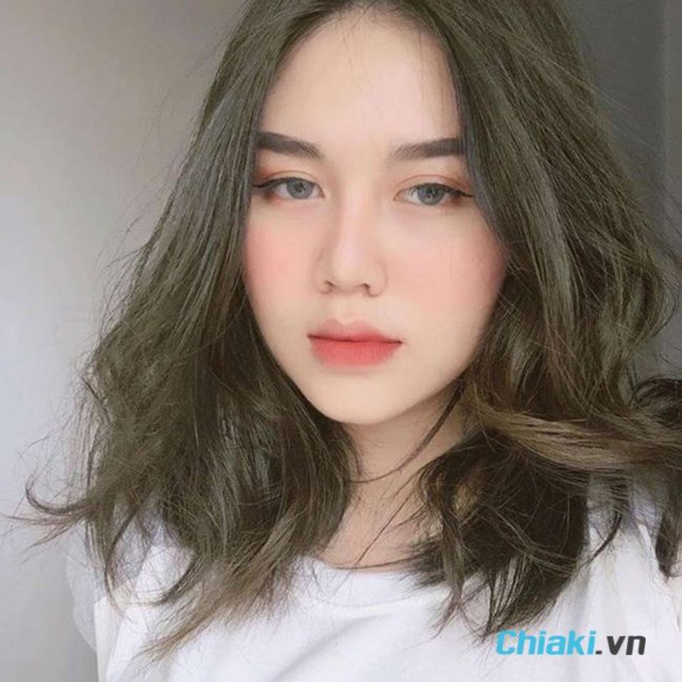 Nhuộm t&oacute;c n&acirc;u t&acirc;y &aacute;nh xanh