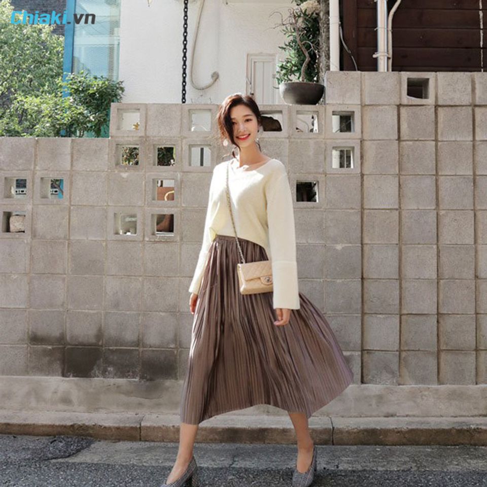 Mix &aacute;o len với ch&acirc;n v&aacute;y xếp ly v&agrave;o m&ugrave;a đ&ocirc;ng