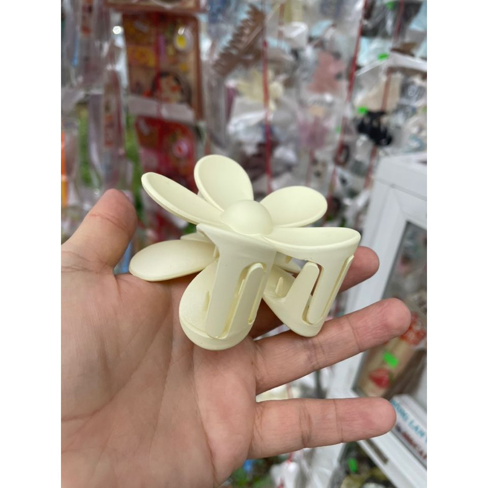 Kẹp tóc nhựa nữ hình hoa